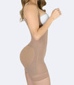 Woman wearing a beige shapewear garment on a white background
